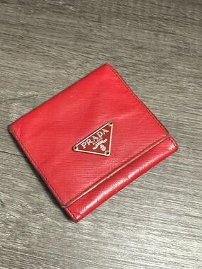 Prada red Saffiano leather wallet/coin pouch.